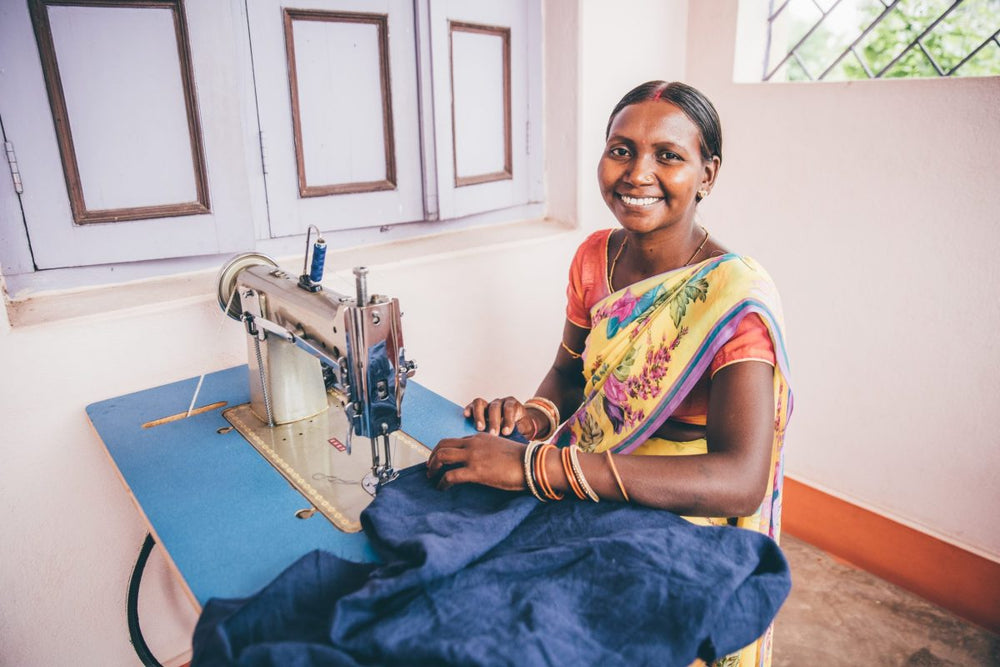 Janaki sewing at Holi Boli (Good Magazine Photo)